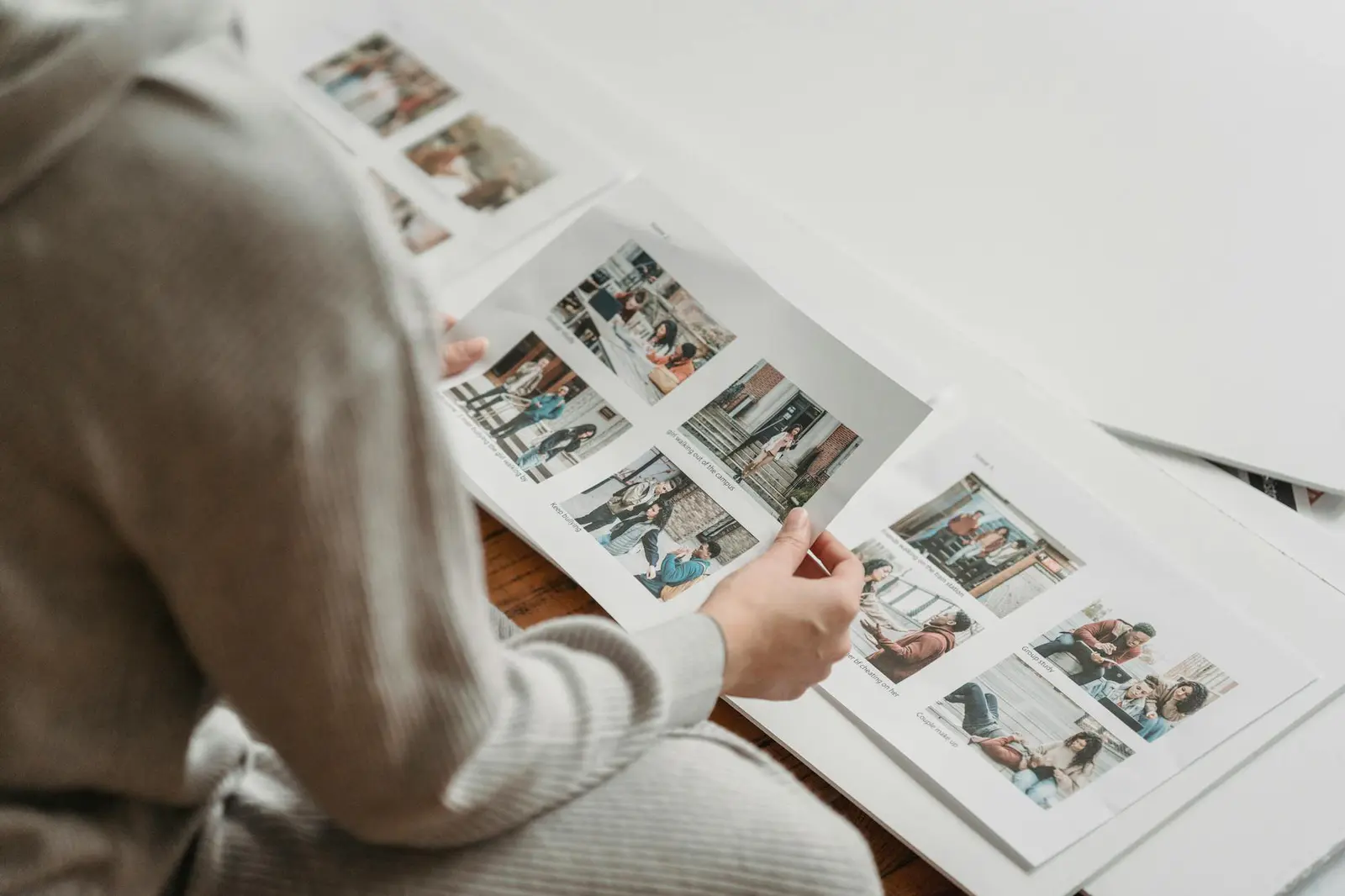 Client viewing printed photographs