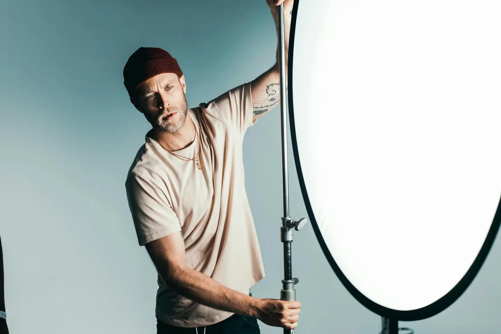Photographer adjusting lights